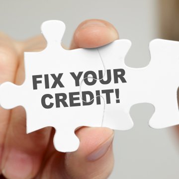 Veracity Credit Consultants credit repair service hand holding credit repair puzzle pieces